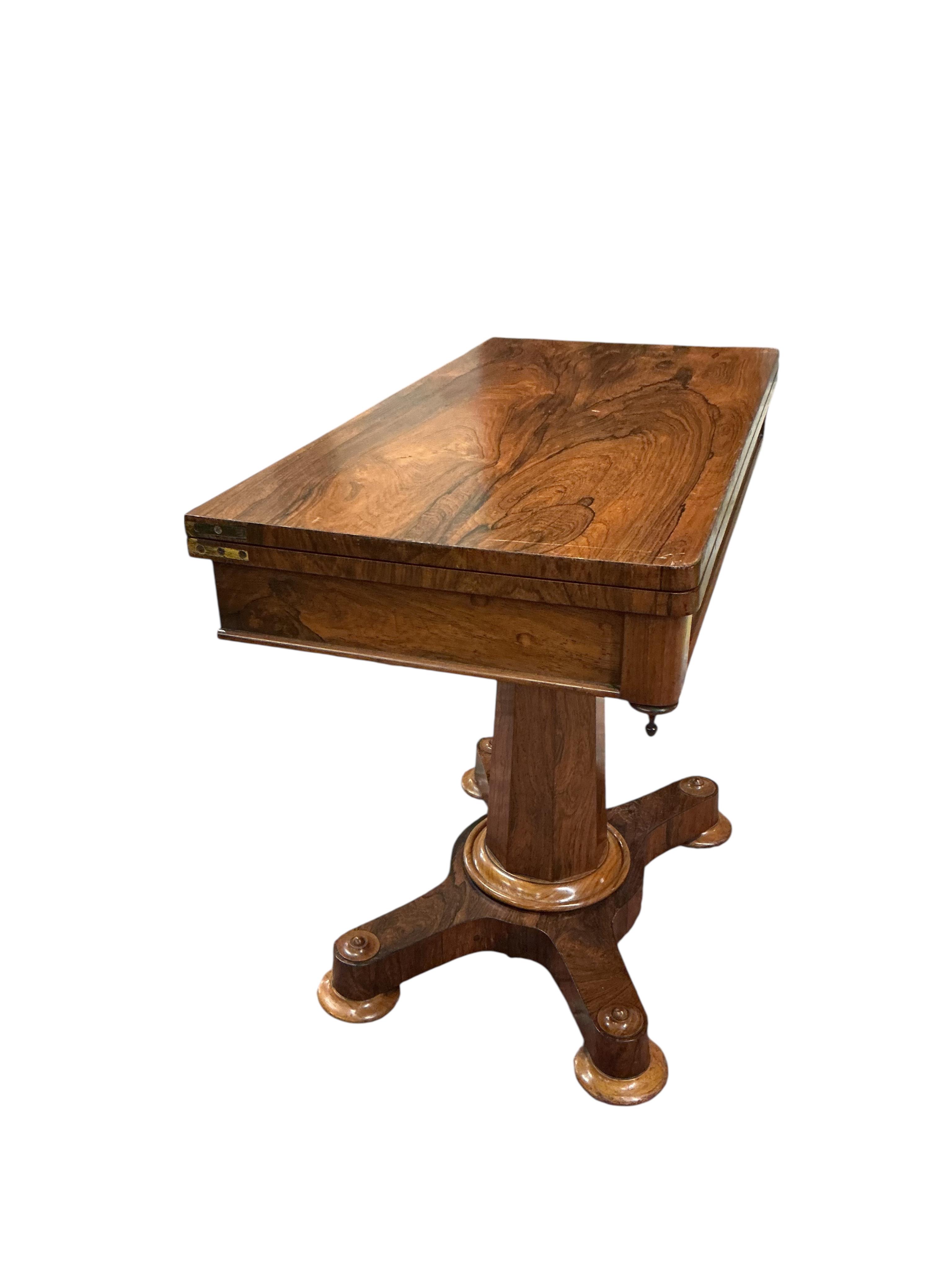 An early Victorian rectangular rosewood folding card table, width 91cm, depth 45cm, height 77cm